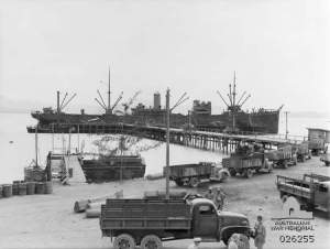 Cargo ship being unloaded at Port Moresby August 1942